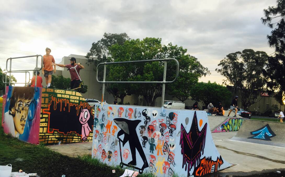 Making a difference: Over 30 children added new artwork to Taree Skate Park during National Youth Week.