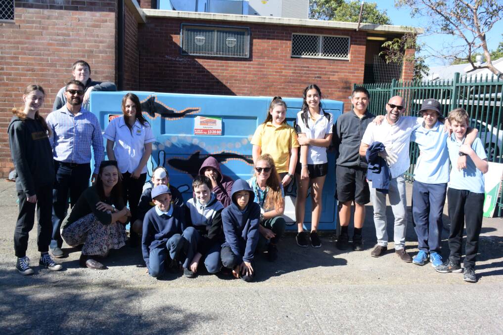 Group effort: House With No Steps teamed up with Taree High School and Taree Public School to paint the padmount on Macquarie Street.