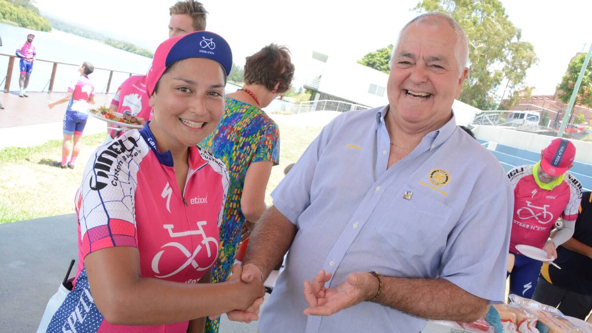 Rotary of Taree President Murray Difford (R) welcomed rider Laura Bird (L) and the 2016 Steer North Ride team to Taree on Tuesday. Photo: Scott Calvin.