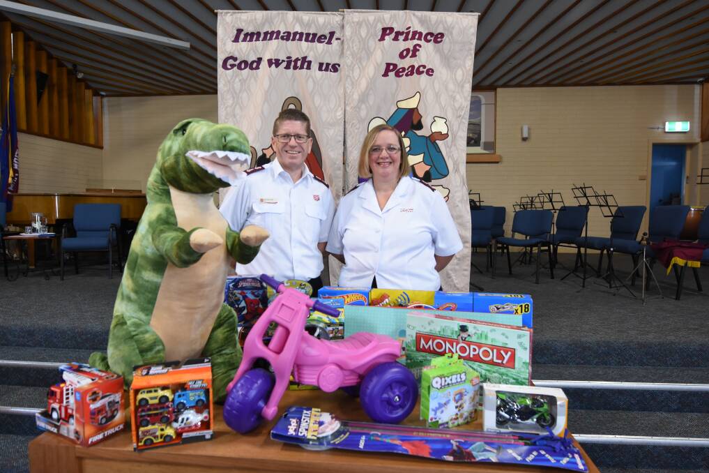 Majors Michael and Sandy Hogg with an array of toys already donated to the appeal. Photo: Scott Calvin. 