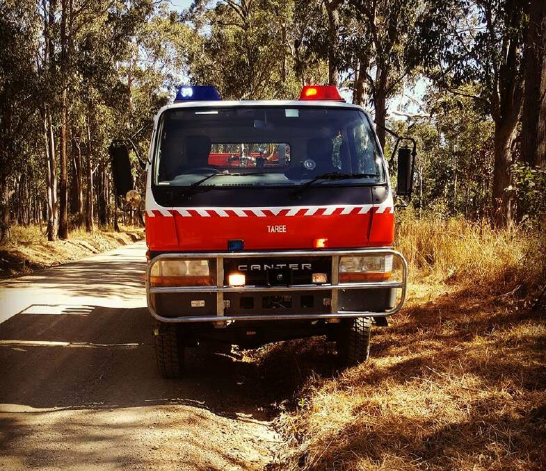 The Taree Rural Fire Service crew confirmed a burn west of Old Bar is well contained. Photo: Taree NSW Fire Brigade.