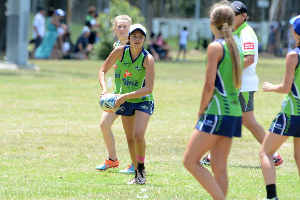 On the ball: Faith Saunders competing for the Taree Flames against Forster Tuncurry under 16s at championships earlier this year. Photo: Scott Calvin.