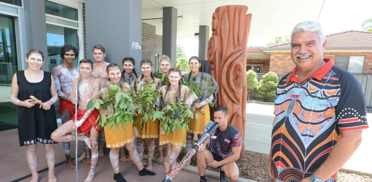 Cultural connection: Taree High School Aboriginal Dance Group joined Manning artist Russell Saunders for the unveiling of his sculpture at Taree's UON Education Centre.