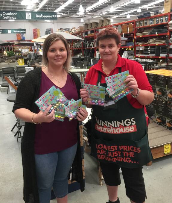 For the children: Jessica Seckold from Challenge Community Services accepted the gifts from Bunnings Taree's Janet Hartas.