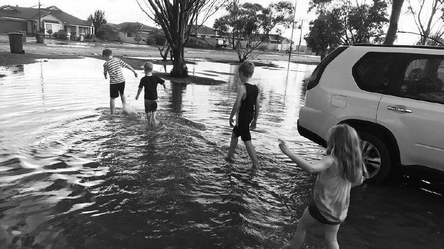 @thommytrash in Port Augusta: Nephews and niece enjoying the puddles after a huge summer storm 