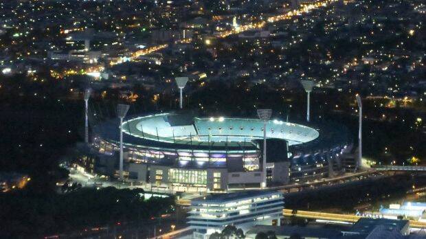 One man died and two people are in hospital after collapsing at the MCG on Saturday night. Photo: Leigh Henningham 