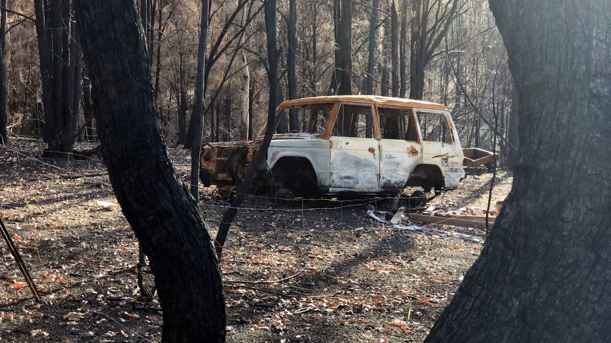 Destroyed: A car on a property in Pappinbarra that perished. Photo: Matt Attard