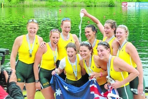 Tess Gerrand (left) and members of the Australian eight celebrate their brilliant win in the Olympic qualification regatta in Switzerland this week.