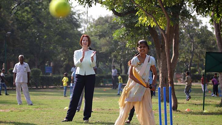 Eyes on the prize ... Julia Gillard at the Magic Bus charity in Delhi yesterday, where she announced Indian cricketer Sachin Tendulkar would be awarded an AM.