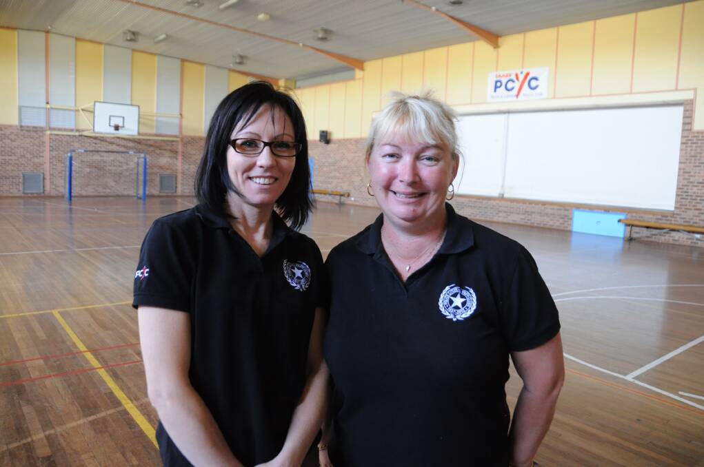 The welcoming smiles of Katrina Corbet and Paula Skinner greet children at Taree PCYC every Friday and Saturday night.
