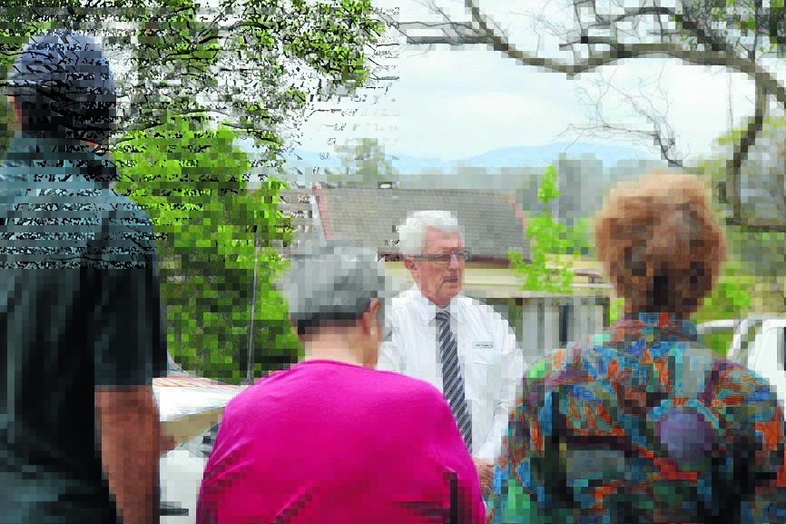 Mayor Paul Hogan held a series of roadside meetings with residents to discuss the withdrawal of federal funding. This meeting was held at Dollys Flat, on Gloucester Road.