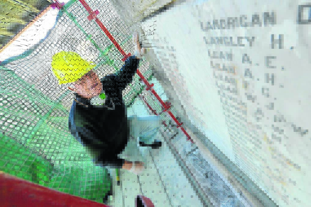 John Edstein is restoring the marble panels and is one of the few people in Australia with the knowledge to restore the lead lettering.