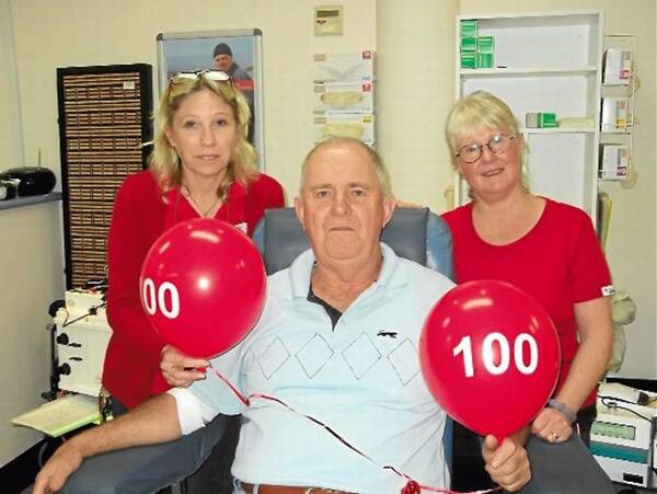 Happy 100th donation: Red Cross donor, Steven Maher with two of Taree’s longest serving nurses, Angela Callaghan and Deb Tisdell.