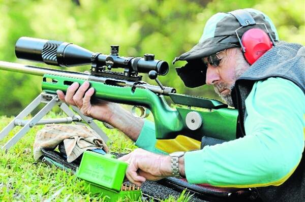 Aiming up: Wingham Rifle Club member Robert Bartlett contesting the open prize shoot.