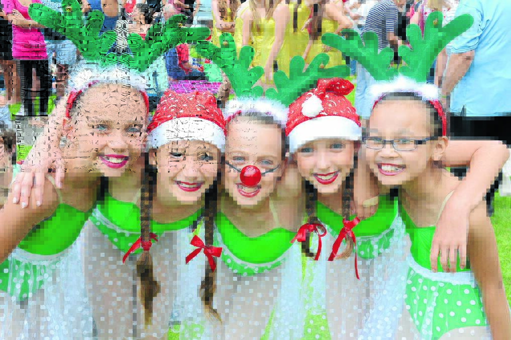 Dancers from the Andrea Rowsell Academy of Dance, Nathalie Dogle, Kalani Cross, Zoe O'Bryan, Bonnie Grice and Grace Cai, ready to perform.