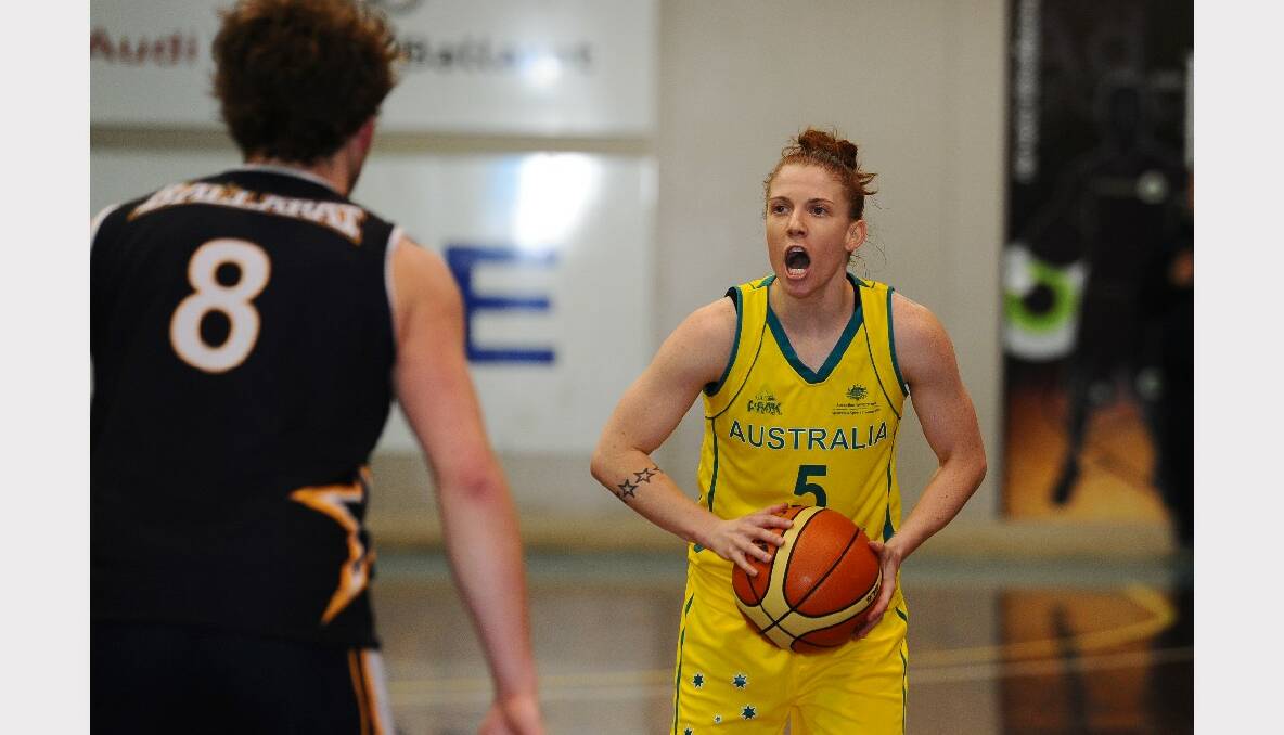 Australian Opals practice game against the Miners Big V youth championships team. Miners Youth- Sean Massey and Opals-  Nat Hurst. PICTURE: KATE HEALY.