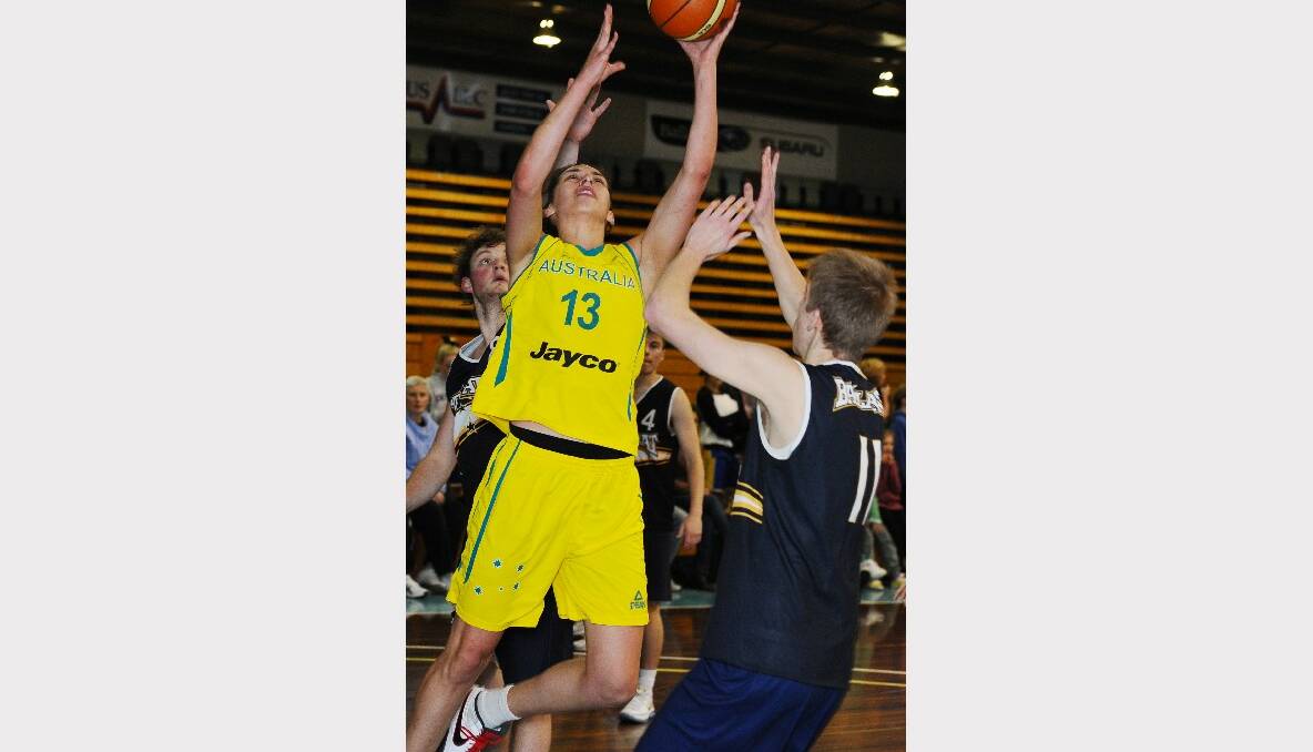 Australian Opals practice game against the Miners Big V youth championships team. Opals-  Marianna Tolo and Miners Youth- Kelsey Gannon. PICTURE: KATE HEALY.