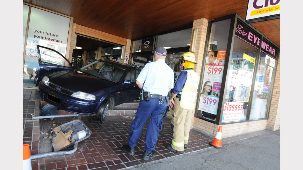 Car smashes into shop