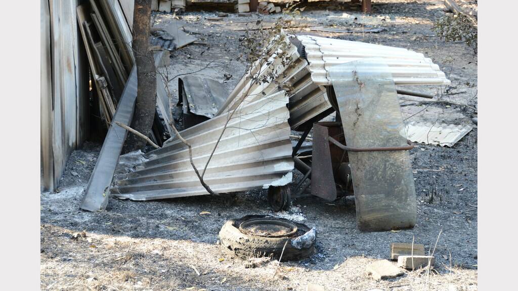 Some of the properties which narrowly escaped the fire near Old Bar road on Thursday afternoon.