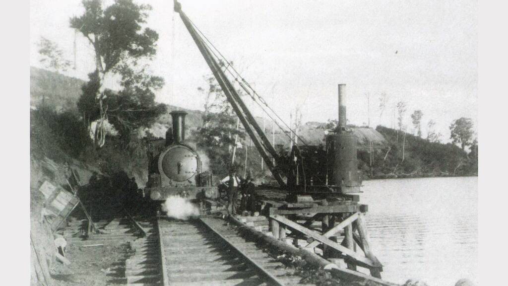 The Manning River was never far away during the construction of the railway line to Wingham and Taree, as this photo shows. Greater Taree City Council photo