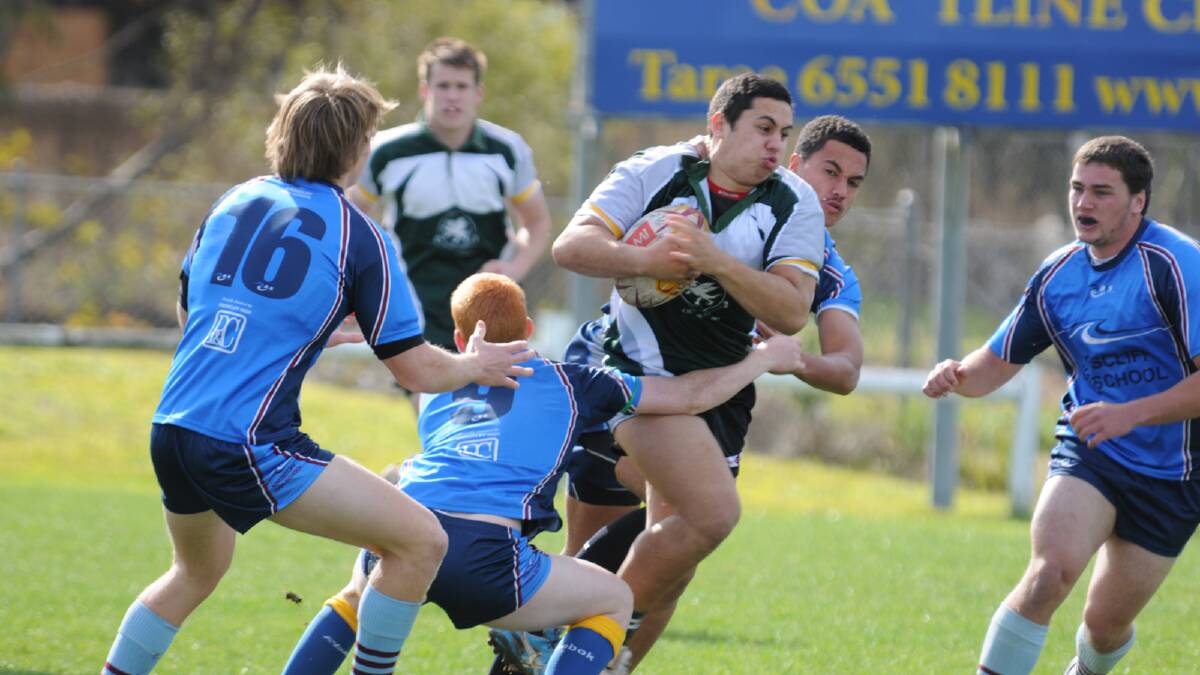 Chatham High’s Dane Coskerie charges into the Kingscliffe defence during the University Shield quarter final played this week.