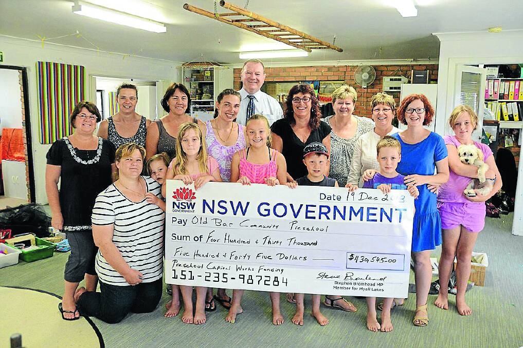 Good news for Old Bar Preschool: (from left) Maxine Pertzel, Jenny Smith, Tabatha McAlister, Leanne Budden, Myall Lakes MP Stephen Bromhead, Marri McLaughlin, Rhonda Yarnold, Diane Nix, Kelly Finch, Sarah, Lynette, Emily and Aimee Gosper, Amarah and Jake Budden and Dylan Finch.
