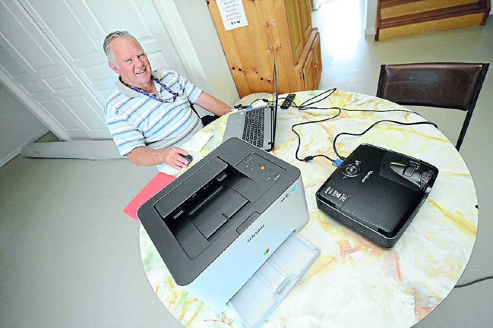 Bob Smith from Harrington Community Action Group with technology purchased with a grant of more than $1000.