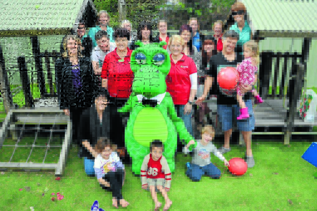 Vote for us! That is the appeal of staff and parents of Manning and Great Lakes Early Intervention. Last week St George's Happy Dragon visited the centre to rally voter support. Pictured back from left is Gill Wesley, Cathy Mannix, Susan Roberts, Zoe Baker, Rachel Laurantus, Kyah Shevill, Nerida Potter, Kate Goodwin, Fiona Macalister, San and Ella Zappala and Lynne Stuttard. Pictured from from left is Glenyss Gaffney, Dylan McCormack, Peta Cass, Sonya Moore, Happy Dragon, Vicky Berg and kids Nathaniel and Kimora Brown and Zac Zappala.