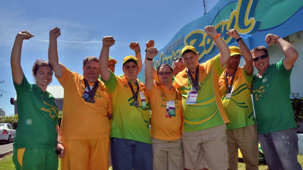PORT MACQUARIE: Rachael Swindells, Adam Smith, Rod Nugent, Josh Ives, Glenn Ball, Kenn Brown, Ryan Mueller, Russell Kapeen and Patrick Brown still celebrating after returning home from the Special Olympics.
