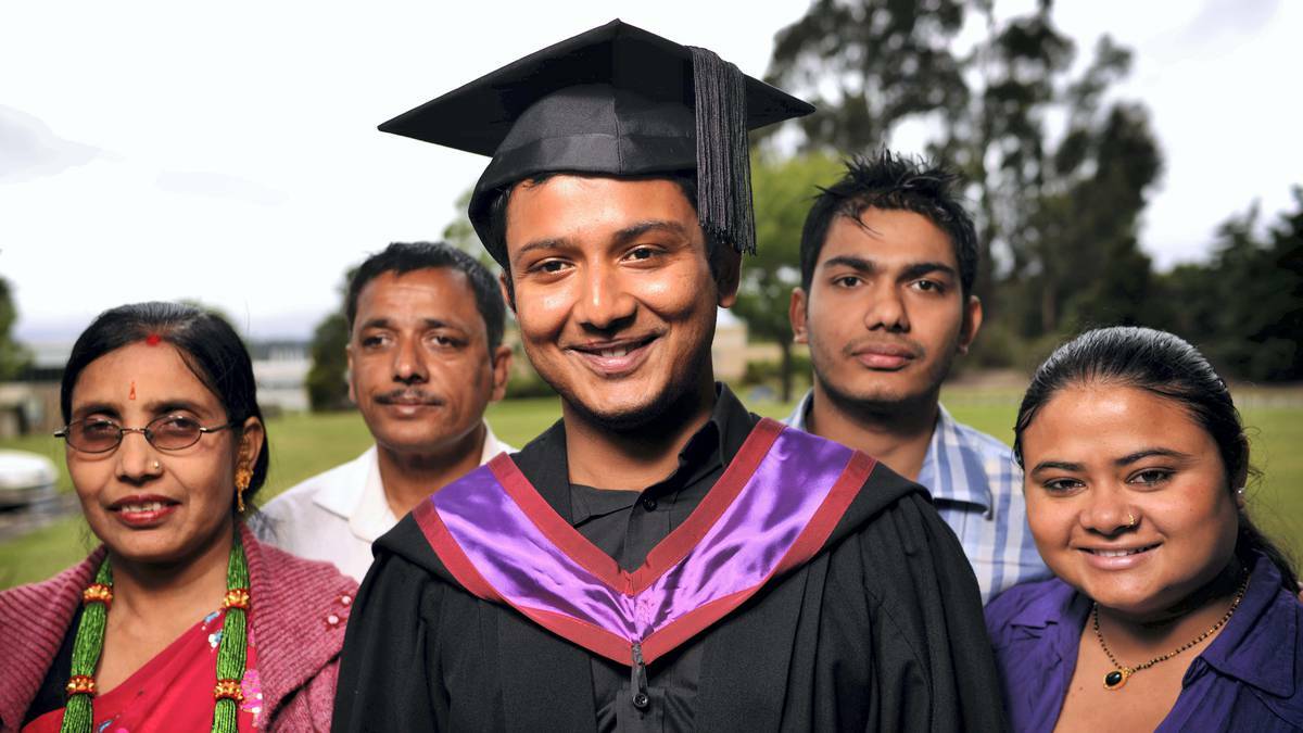 TASMANIA: Australian Maritime College graduand Jyoti Bhandari with his parents Deuki and Thagu, brother Tulsi and wife Ganga .