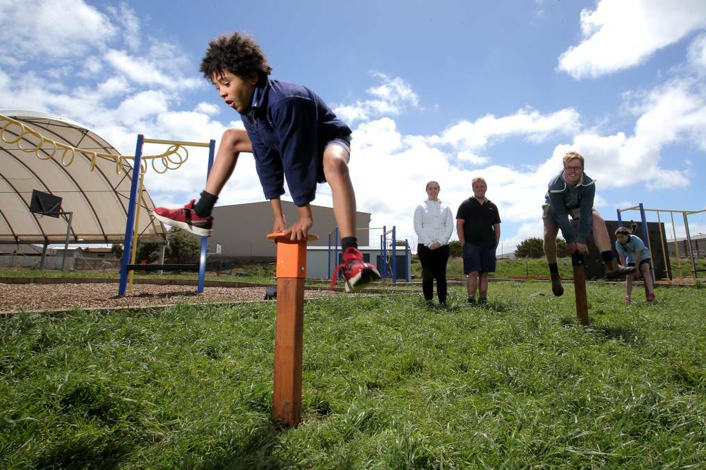 WARNAMBOOL: Merrivale Primary school has new leapfrog posts thanks to Brauer College VCAL students. Pictured L-R: Obi Wakefield, 10, Hayley Moloney, 18, Tom Keane, 18, Callum Rowe, 18, and Layla Wilson, 10. Picture:LEANNE PICKETT