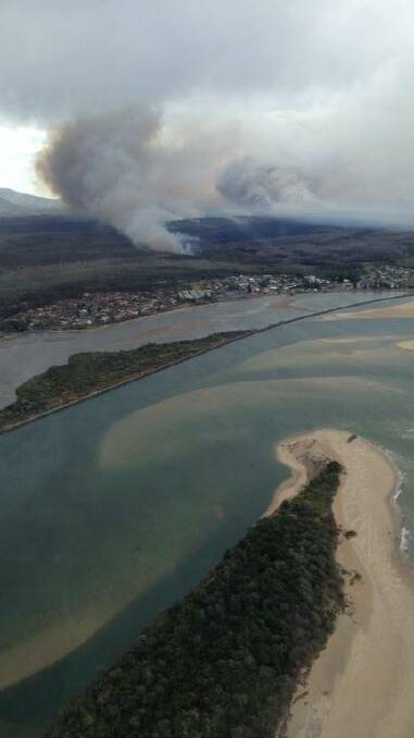Looking north over Harrington at the Crowdy Gap Fire. Pic: NSW RFS Bomber 21