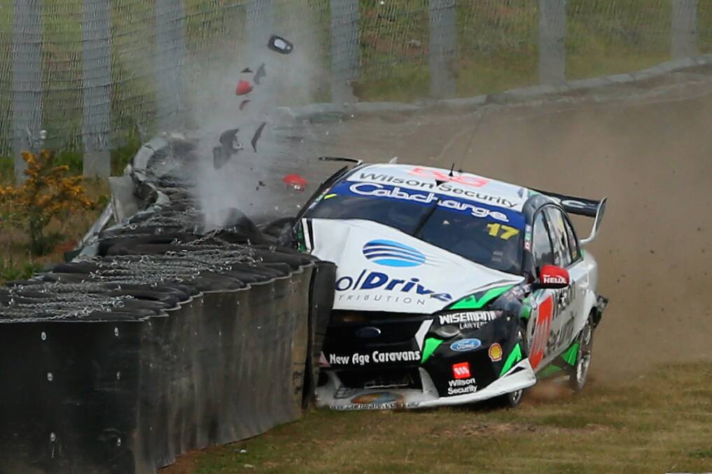 IMPACT: Ash Walsh crashes into a wall in his number 17 Dick Johnson Racing Ford during the Sandown 500. Clearly he is hoping for better at Mount Panorama next week. Photo: GETTY IMAGES 	100113walsh