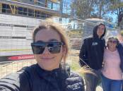 ACM reporter Alanna Tomazin, 24, with her brother Nicolas, mother Annmarie, and father Mitch when she and Nicolas bought and built a family home in the NSW Hunter region. Picture: Supplied