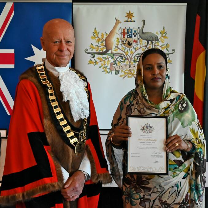 Aida Elawad with Mayor David West at the Citizenship Ceremony in Taree.