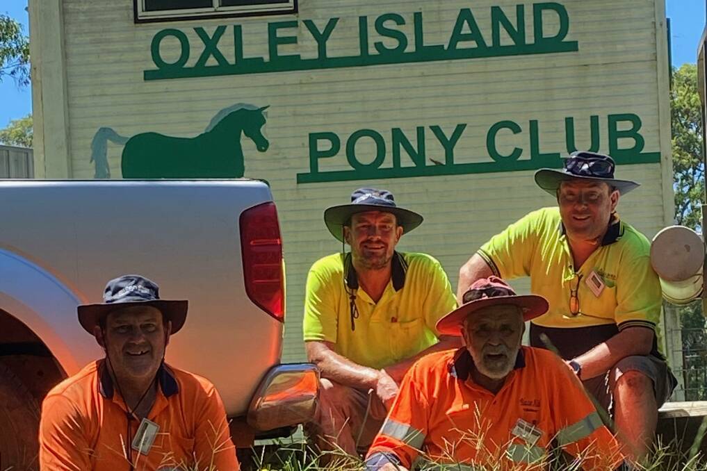 Brad, Steve, Bill, and Bill from BlazeAid have set up camp at Oxley Island Hall. Photo supplied