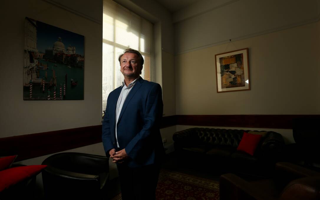 All for one: Newcastle psychologist Michael Bazaley. "It's a cultural genocide that Putin wants - and he's said it. Putin doesn't believe that Ukrainians exist as Ukrainians; he believes that everyone's Russian. But that's a myth that the Russians are obsessed," he says. Picture: Marina Neil.