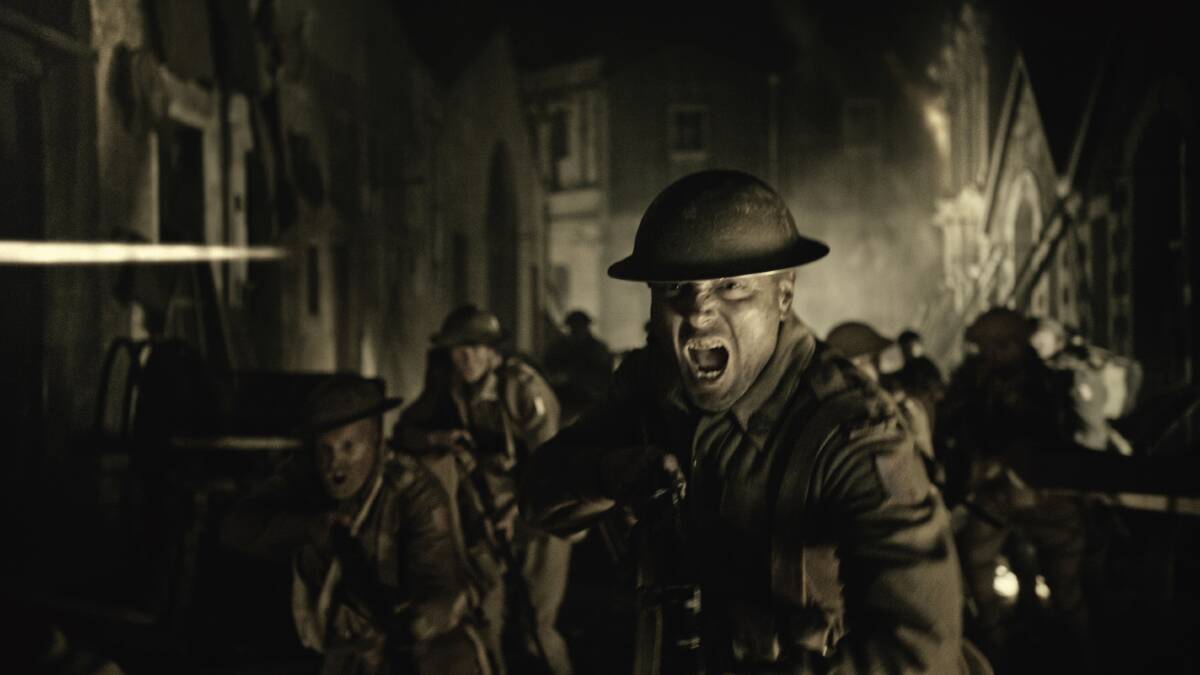 REALISTIC: Soldiers charge in a film at the Sir John Monash Centre which recounts the terrifying battle at Villers-Bretonneux - a battle that forged strong national bonds. Picture: Department of Veterans’ Affairs.