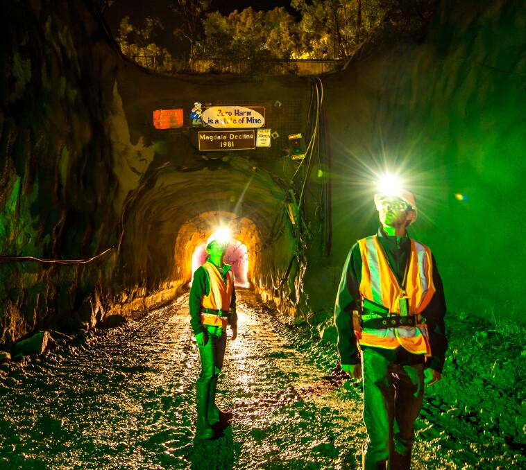 LIGHT IN THE DARK: Melbourne University scientists John Koo and Francesco Tenchini inspect the Stawell Gold Mine in Victoria, where they hunted deep underground for signs of the darkest matter in the universe. Picture: File photo