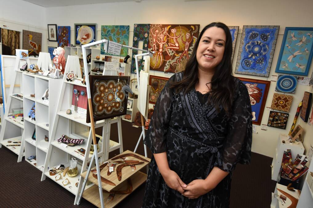 Raechel Saunders at the Deep Water Shark Gallery shop in Centrepoint Arcade, which features her work along with that of her father Russell and other family members Jeremy, Corey, Jayden and Faith Saunders. Photo: Scott Calvin.