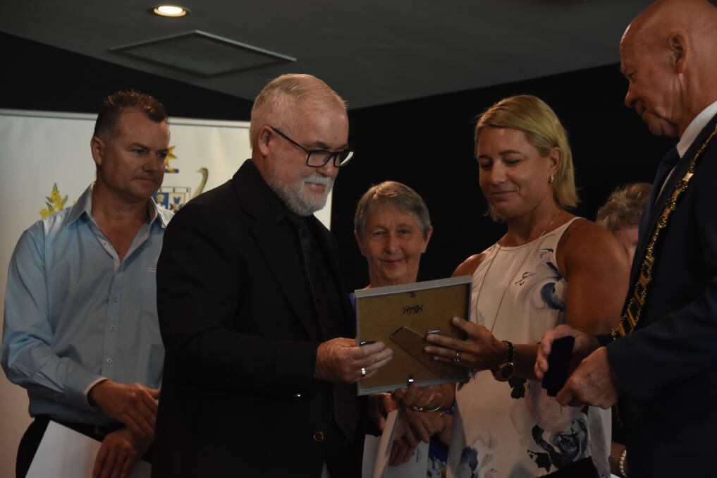 David Denning being presented his certificate at the Australia Day ceremony in Taree.