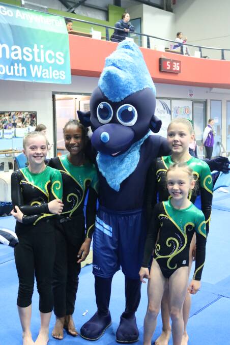 Taree gymnasts with Gymnastics NSW mascot Kip.