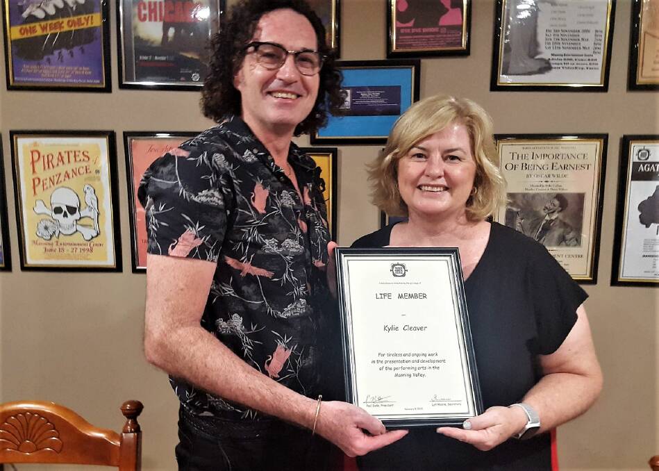 Recognition: Taree Arts Council president Paul Eade presents Kylie Cleaver with her life membership certificate.