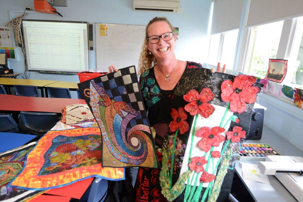Teacher Heidi Speers with some examples of what the Bernina B79 sewing machine can help create.