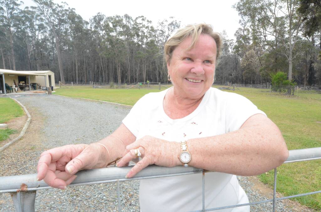 Safe: Ann Greene is smiling now, but it was a different story on Saturday as she and husband Ron left their Hallidays Point home to escape the oncoming bushfire. Photo: Scott Calvin.