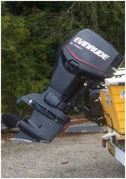 Outboard motor stolen from boat, boat and trailer burnt out
