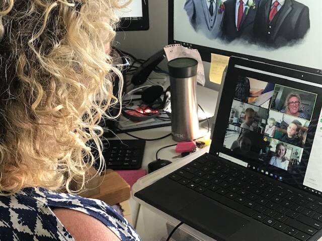 Connection: Teacher Janine Stephen catches up with her K to 2 students online. 