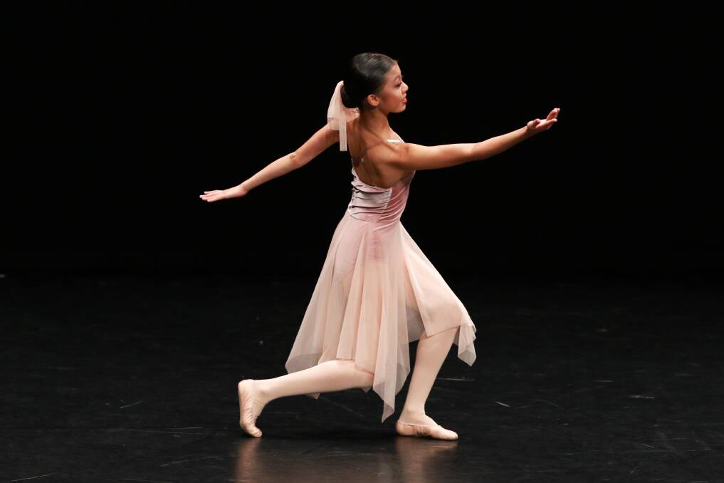 On stage: Irene Ling from Taree received first place in Section 421b Novice – Modern Expressive Solo 12 years and under. Photo: Scott Calvin/Carl Muxlow.