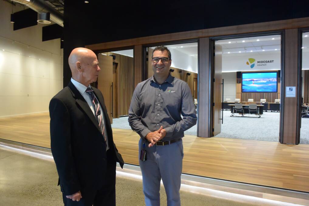 MidCoast Council mayor David West and general manager Adrian Panuccio, with the new council chambers in the background.