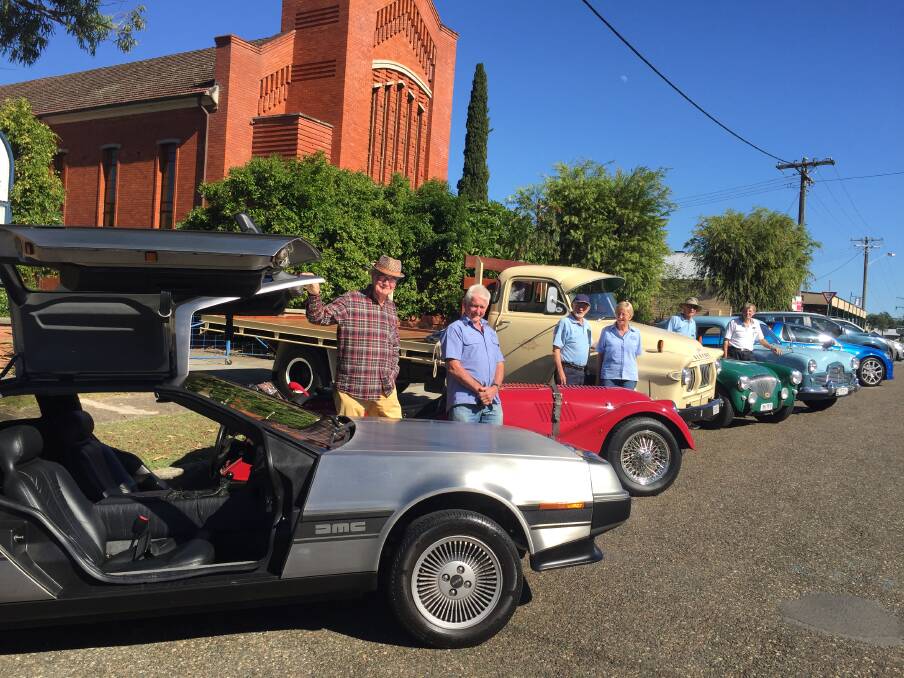 Display: Heritage cars will be on show in Wingham on Sunday. Pictured are Gary Cox, Alan Sambell, Robyn and Lindsay Higson, Tony Ash and Adrian Nash.